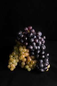 Kaboompics - Black and Green Grapes Still Life on Dark Background
