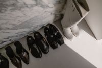Kaboompics - Assorted Leather Shoes and White Boots from Above