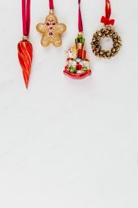 Christmas Gifts and Decorations on White Marble Background