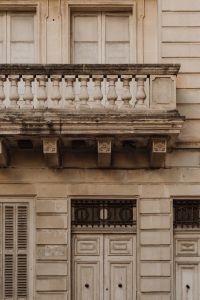 Kaboompics - Classical Stone Balcony with Balusters and Weathered Facade