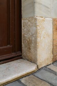 Kaboompics - Stone Corner beside Historic Wooden Door