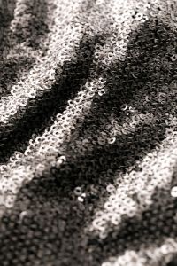 Kaboompics - Black Sequin Fabric with Silver Highlights