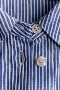 Kaboompics - Blue Striped Shirt – Open Collar Button Close-Up