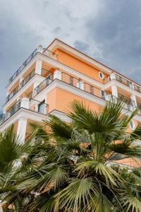 Kaboompics - Grand Hotel Royal Sorrento Facade Framed By Mediterranean Palms
