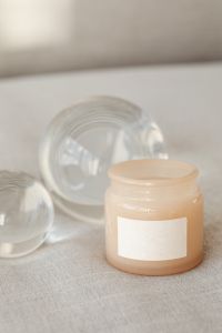 Kaboompics - Open Candle Jar Mockup with Glass Spheres on Linen