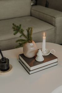 Kaboompics - Minimal Christmas Coffee Table Decor with Candle and Vase