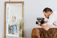 Kaboompics - Filmmaker with DSLR Camera Taking Shoots