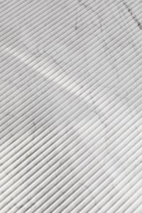 Kaboompics - Close-Up of Pale Marble Table Surface with Diagonal Gray Veins, Minimalist Interior Background