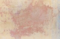 Kaboompics - Pink Paint Showing Through Yellow Plaster