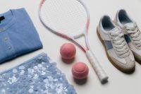 Kaboompics - Tennis Racket, Pink Balls and Blue Sportswear Flat Lay