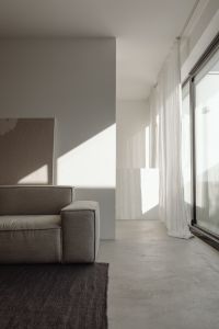 Kaboompics - Minimalist Living Room with Neutral Sofa and Sheer Curtains