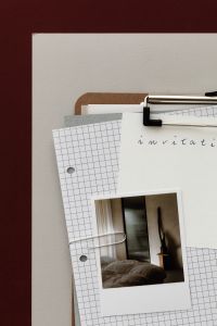 Kaboompics - Analogue Invitation Moodboard with Instant Photo and Grid Paper