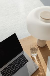Kaboompics - Minimal Desk Background with Lamp, Laptop Edge and Copy Space