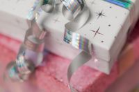 Kaboompics - White Star Print Gift Box with Silver Curling Ribbon