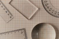 Kaboompics - Mathematical Instruments with Glass Sphere Background