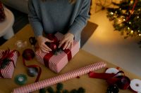 Kaboompics - Wrapping Red Gift Box with Ribbon and Scissors