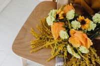 Kaboompics - Close Up of Autumn Flower Bouquet on Wooden Chair