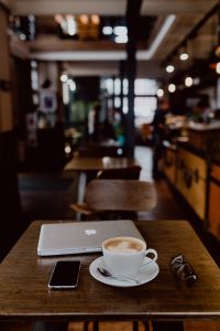 Cup of coffee on table in cafe