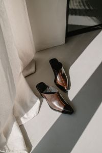 Kaboompics - Brown Leather Loafers in Sunlight by Curtain
