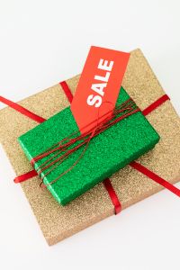 Kaboompics - Red Sale Tag on Green Gift Box and Gold Present