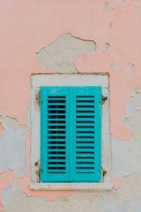 Kaboompics - Turquoise Shuttered Window on Peeling Pink Stucco, Rovinj