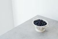 Kaboompics - Minimal White Colander Filled with Blueberries