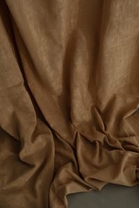 Kaboompics - Dark Brown Curtain Draped in Deep Vertical Folds, Neutral Textile Texture