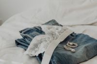 Kaboompics - White Lace Triangle Top and Silver Jewelry