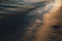 Kaboompics - Golden Hour Sea Wave Texture Dark Background