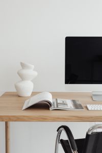 Kaboompics - Minimal Home Office Desk with Open Magazine, Ceramic Vase and iMac