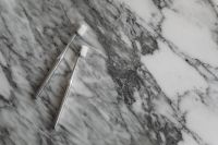 Kaboompics - Overhead Pair of White Toothbrushes on Gray Veined Marble, Minimal Bathroom Background