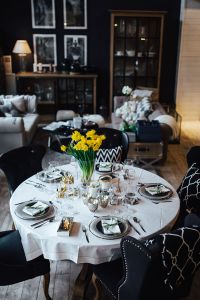 Kaboompics - Table decorations with golden motifs and yellow flowers