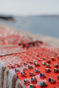 Kaboompics - Close-Up of Colorful Handmade Rings on a Naples Street Market Display