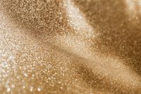 Kaboompics - Golden Sparkle Texture With Broad Diagonal Light Sweep