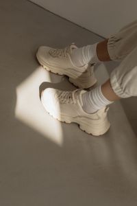 Kaboompics - White Sneakers and Joggers Fashion Detail