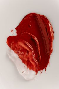 Kaboompics - Red Lipstick and Clear Gloss Texture