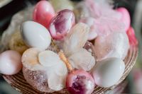 Kaboompics - Pastel Easter Eggs and White Fluff in a Glass Bowl, Soft Spring Still Life