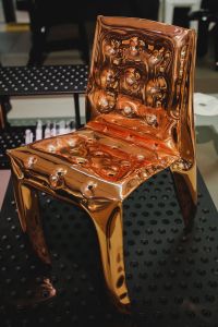 Kaboompics - Close-Up of an Amber Transparent Designer Chair at a Contemporary Furniture Exhibition