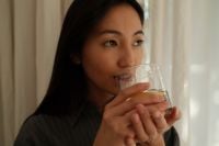 Kaboompics - Woman Drinking a Morning Beverage at Home