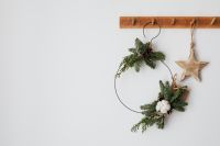 Kaboompics - Natural Christmas Wreath with Wooden Star and White Copy Space