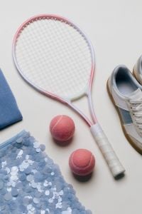 Kaboompics - Tennis Racket, Sneakers and Pink Balls Flat Lay