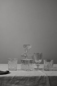 Kaboompics - Monochrome Crystal Glassware and Decanter Still Life with Copy Space