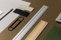 Kaboompics - Brown Office Desk Flat Lay with Rulers, Pencil, Paper Clips and Color Swatches