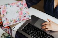 Kaboompics - Happy casual beautiful woman working on a laptop