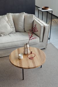 Kaboompics - Coffee Table Styling with Vase, Candle and Sofa