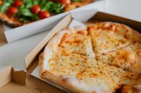 Kaboompics - A workplace full of pizza