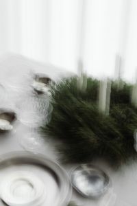 Kaboompics - Soft Focus Christmas Table Detail with Evergreen Advent Wreath and Silver Place Setting