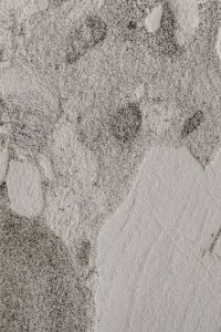 Kaboompics - Pale Rough Stone with Irregular Gray Patches