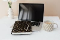 Kaboompics - Work from Home Laptop and Coffee Framed by White Flowers