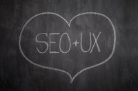 Kaboompics - SEO and UX Lettering inside a Chalk Heart on a Black Blackboard, Digital Marketing Background